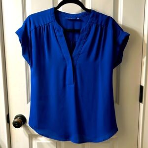 Royal blue blouse, cap sleeves, pleated back, rounded hem, size S, polyester